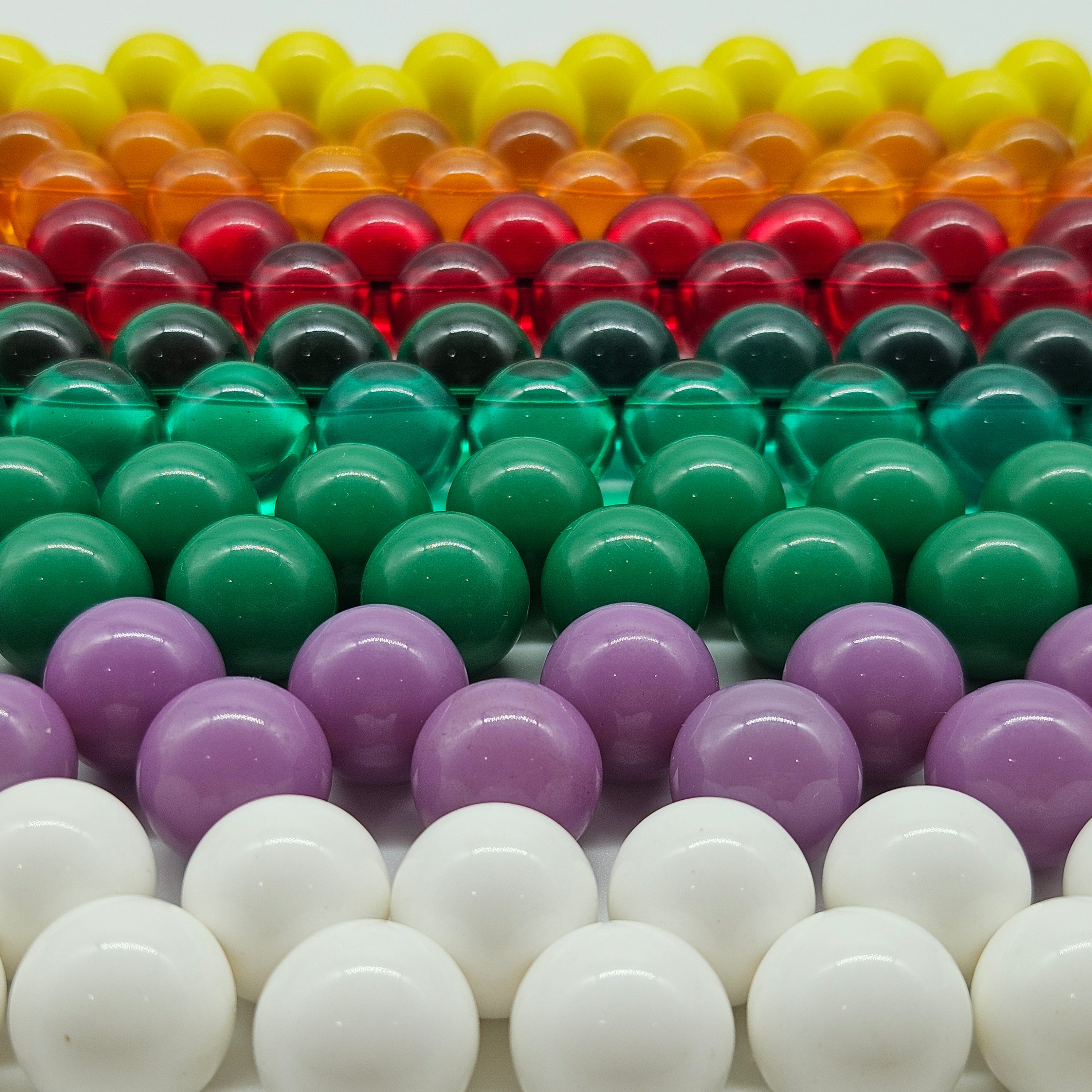 Colorful beaded necklaces in rows.