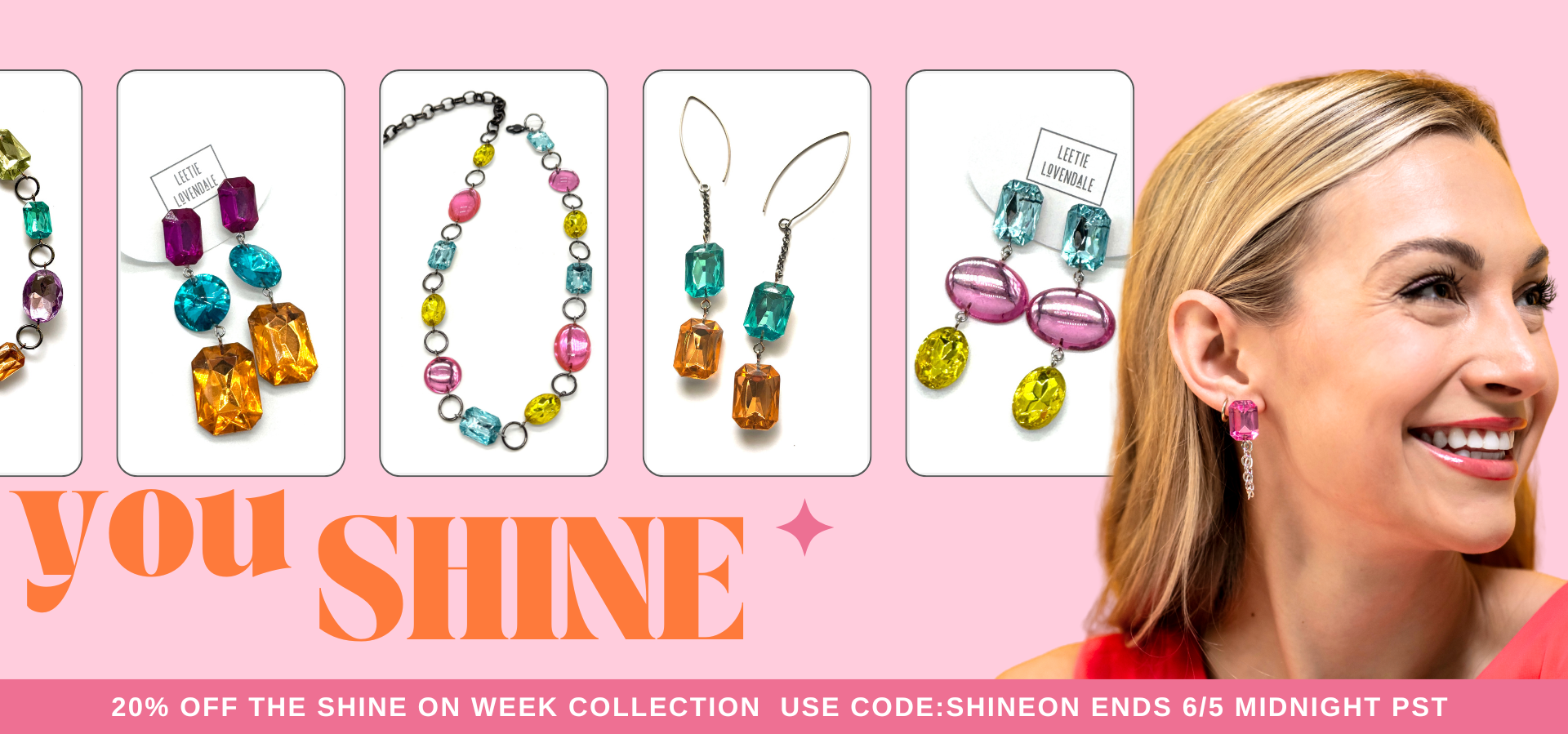 Jewelry set with colorful gemstones on a pink background, featuring a woman wearing earrings.