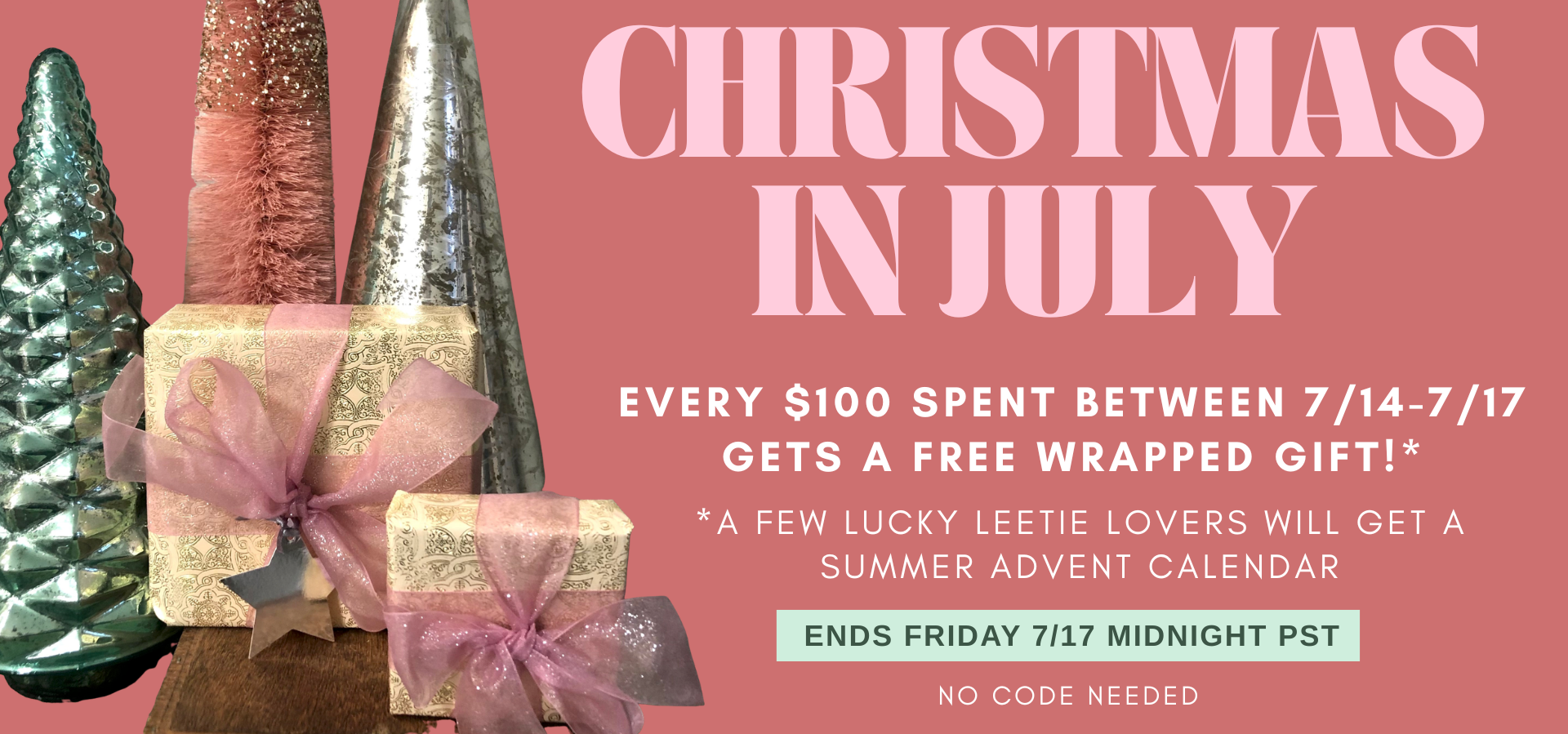 Promotional graphic for a 'Christmas in July' summer advent calendar. The design features a dusty rose background with white text detailing a $100 spending offer between July 14-17, 2017, which grants a free wrapped gift.