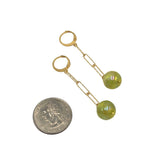 quarter next to earring to show size