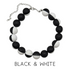 Black and white beaded necklace on a white background
