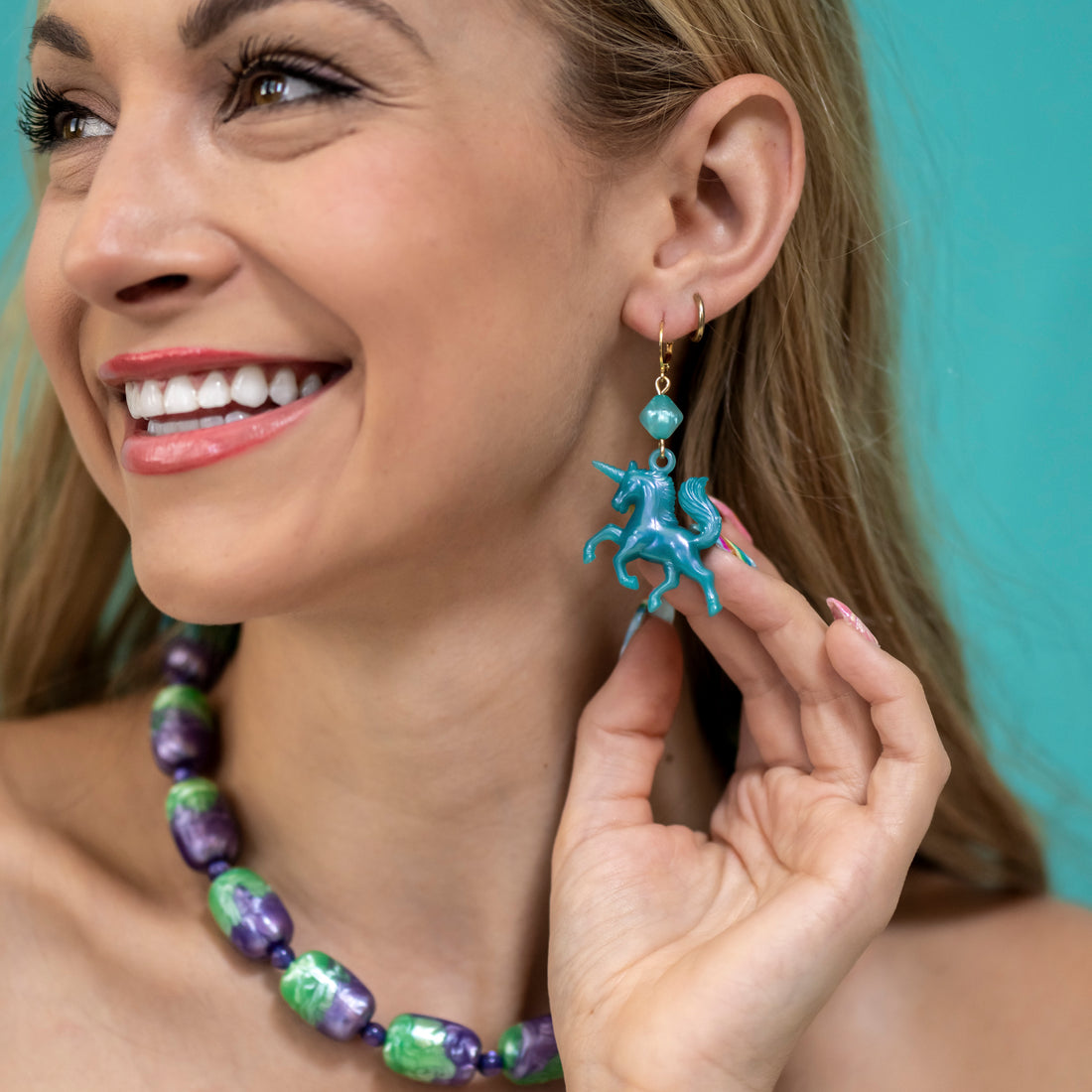 Teal Glow Unicorn Earrings