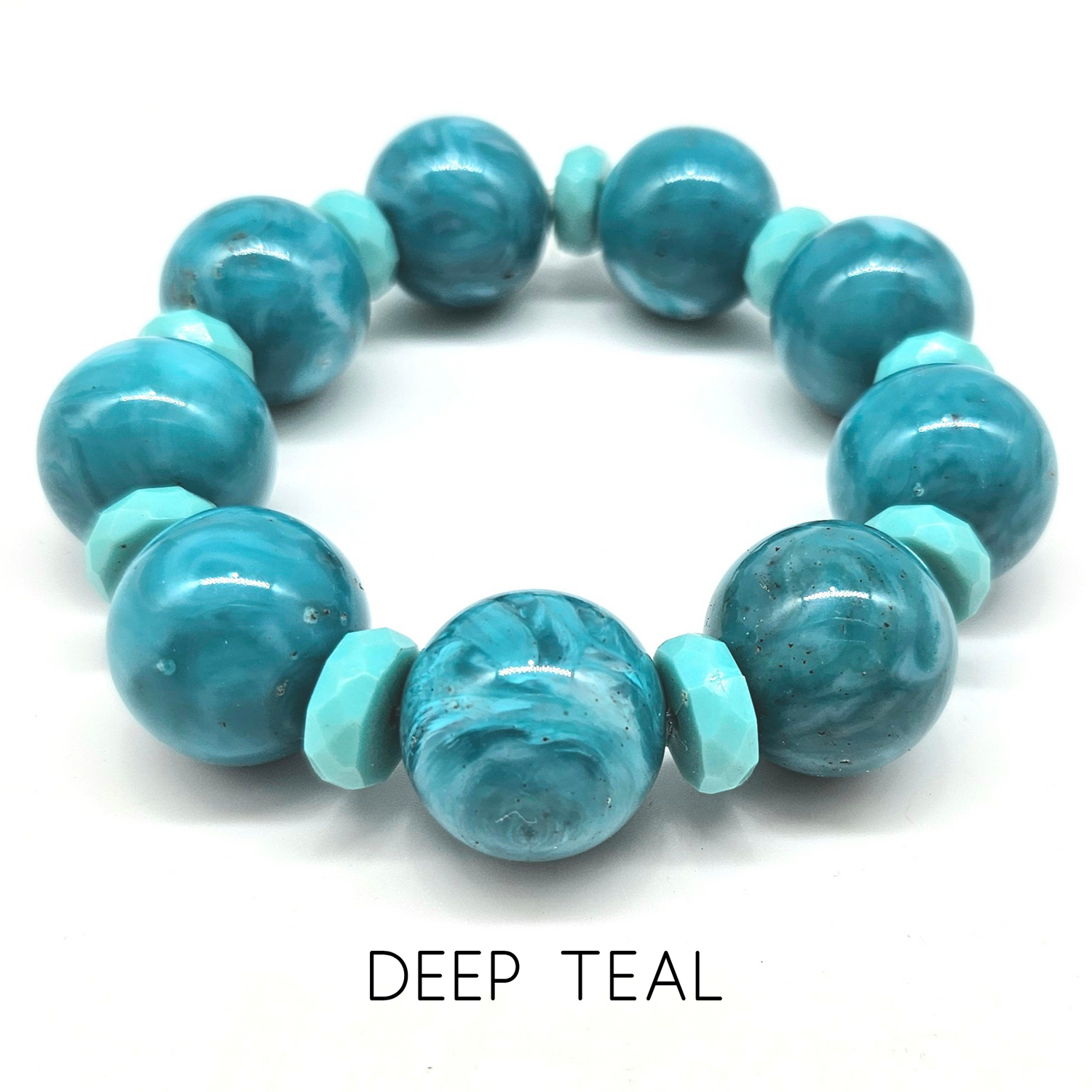 Turquoise beaded bracelet on a white background with &