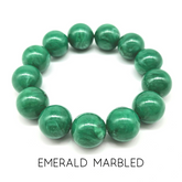 Green marbled bracelet on a white background with &