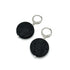 Black round keychains with silver loops on a white background
