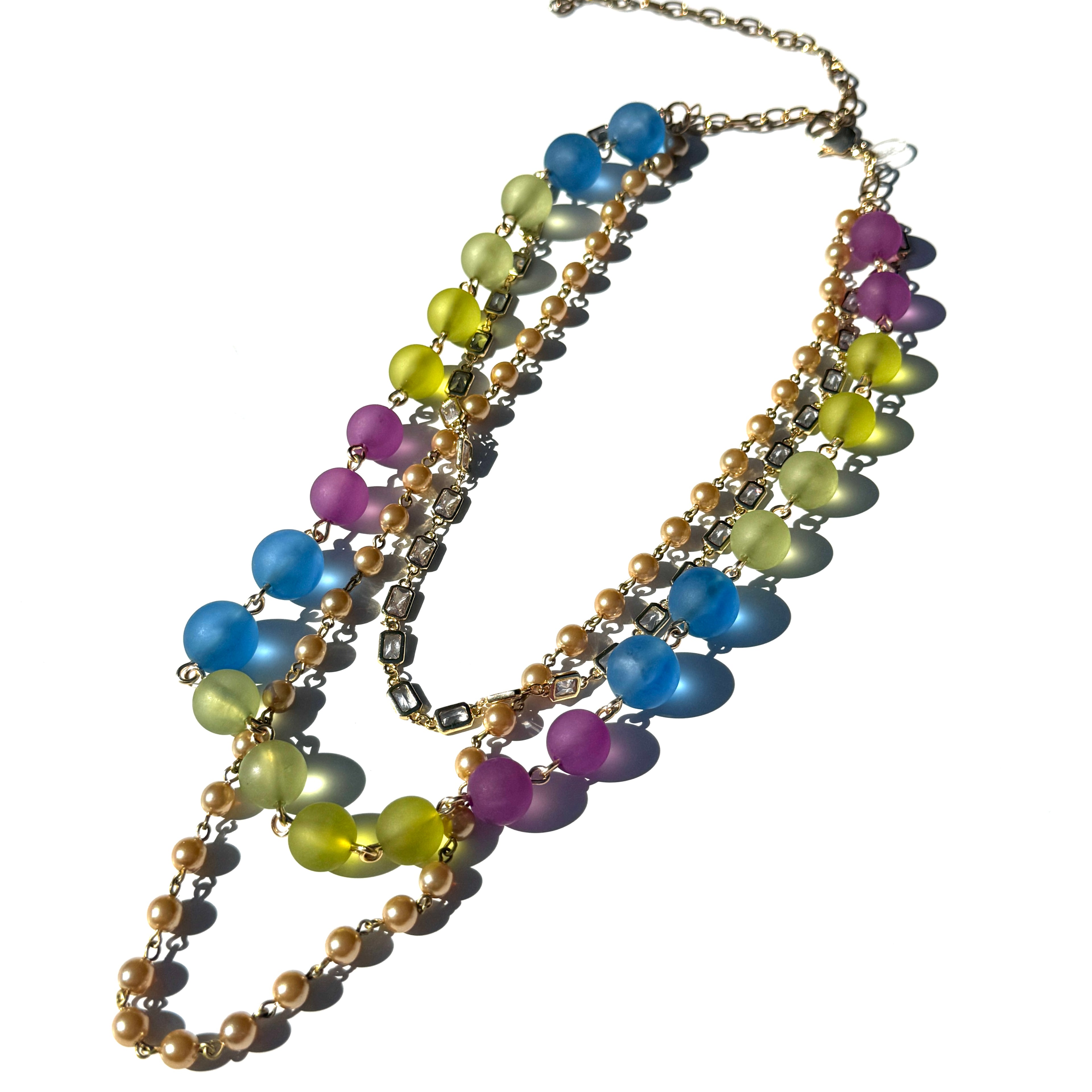 Multicolored beaded necklace on a white background