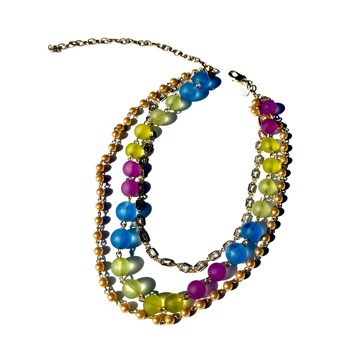 Multicolored beaded necklace on a white background