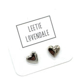 Heart-shaped earrings on a Leettie Lovendale branded card