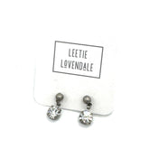 Pair of earrings on a card with &