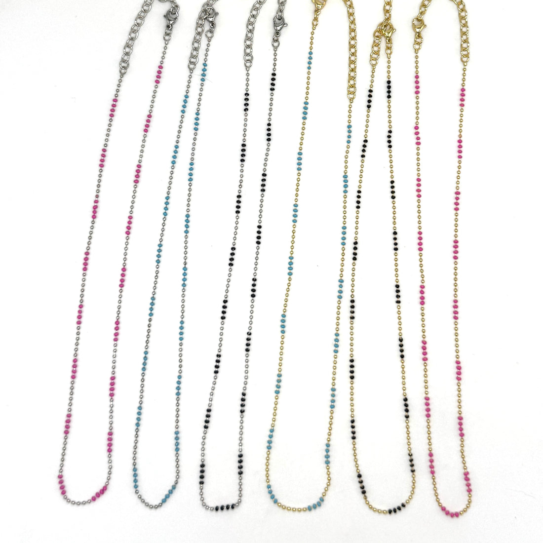 Set of 6 necklaces in different colors on a white background