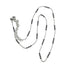 Silver necklace with black beads on a white background
