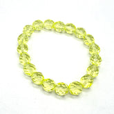 Yellow beaded bracelet on a white background
