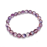 Purple beaded bracelet on a white background