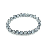 Beaded bracelet with gray marbled pattern on a white background