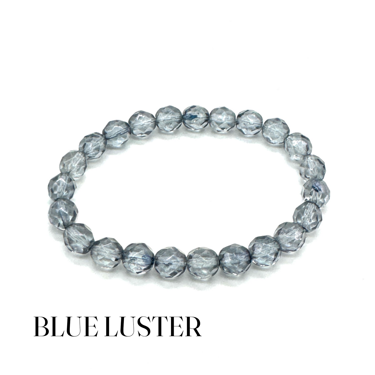 Blue luster beaded bracelet on a white background