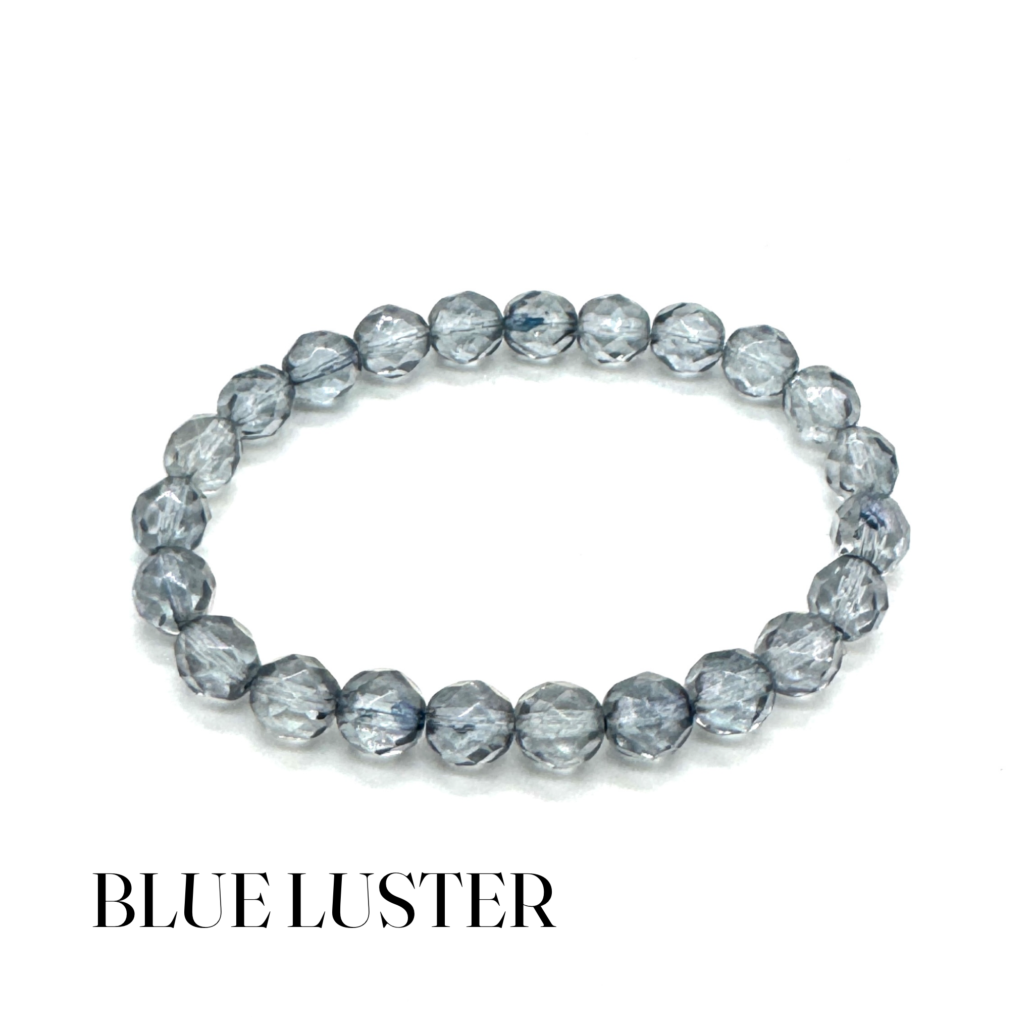 Blue luster beaded bracelet on a white background