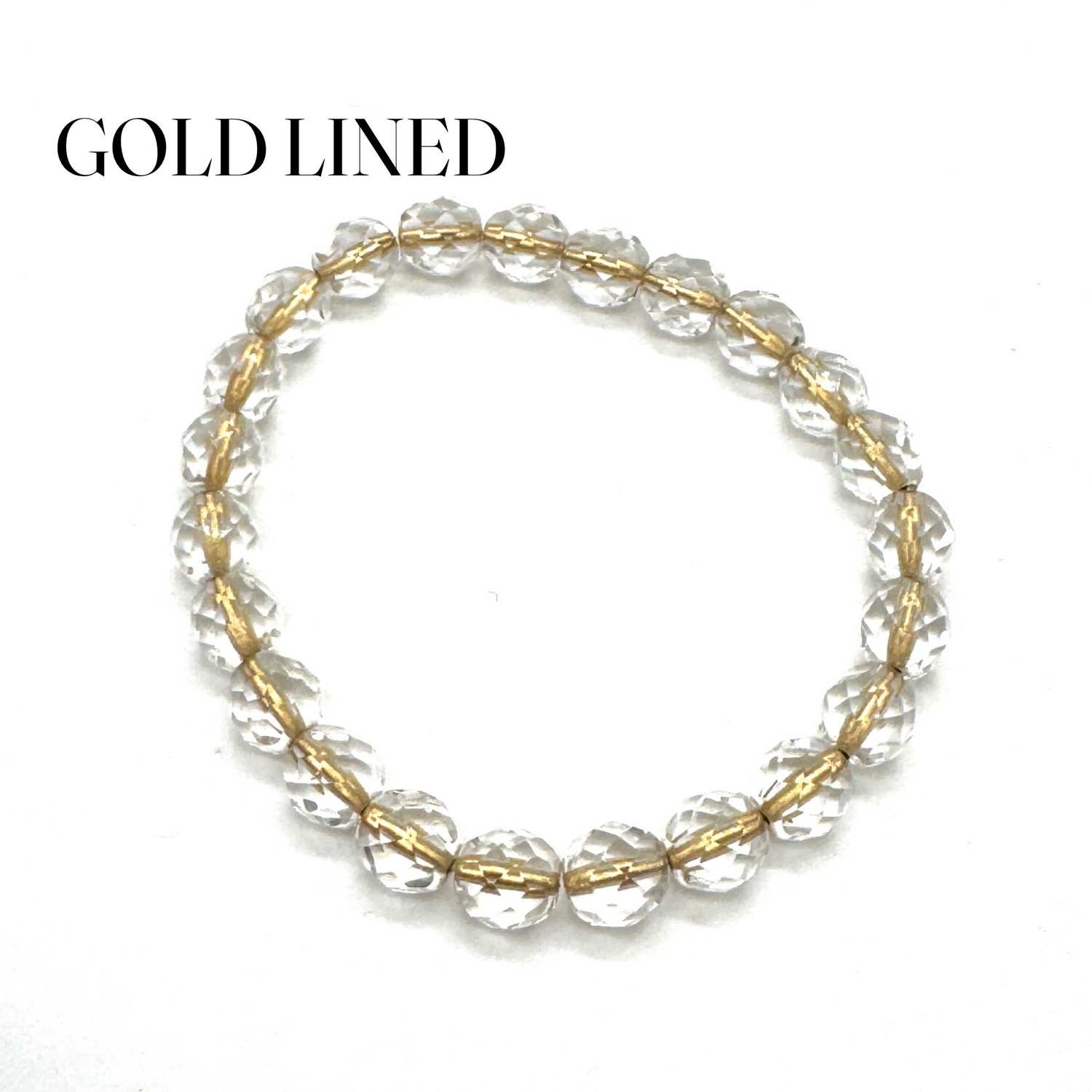 Gold-lined clear beaded bracelet on a white background