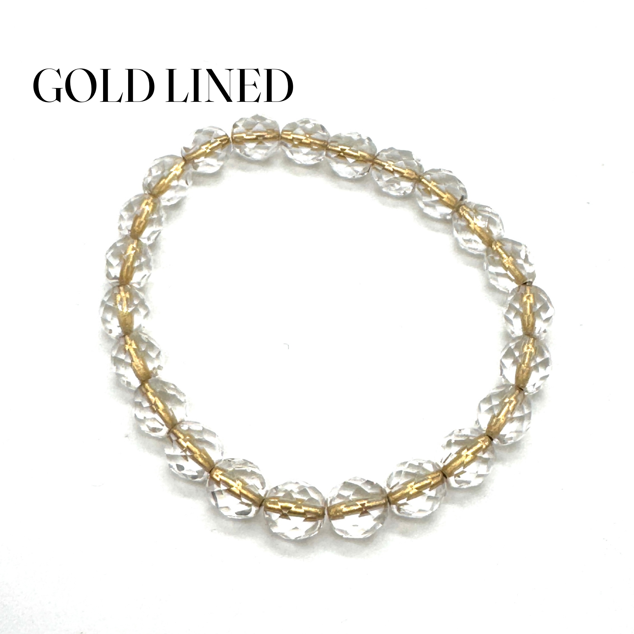 Gold-lined clear beaded bracelet on a white background