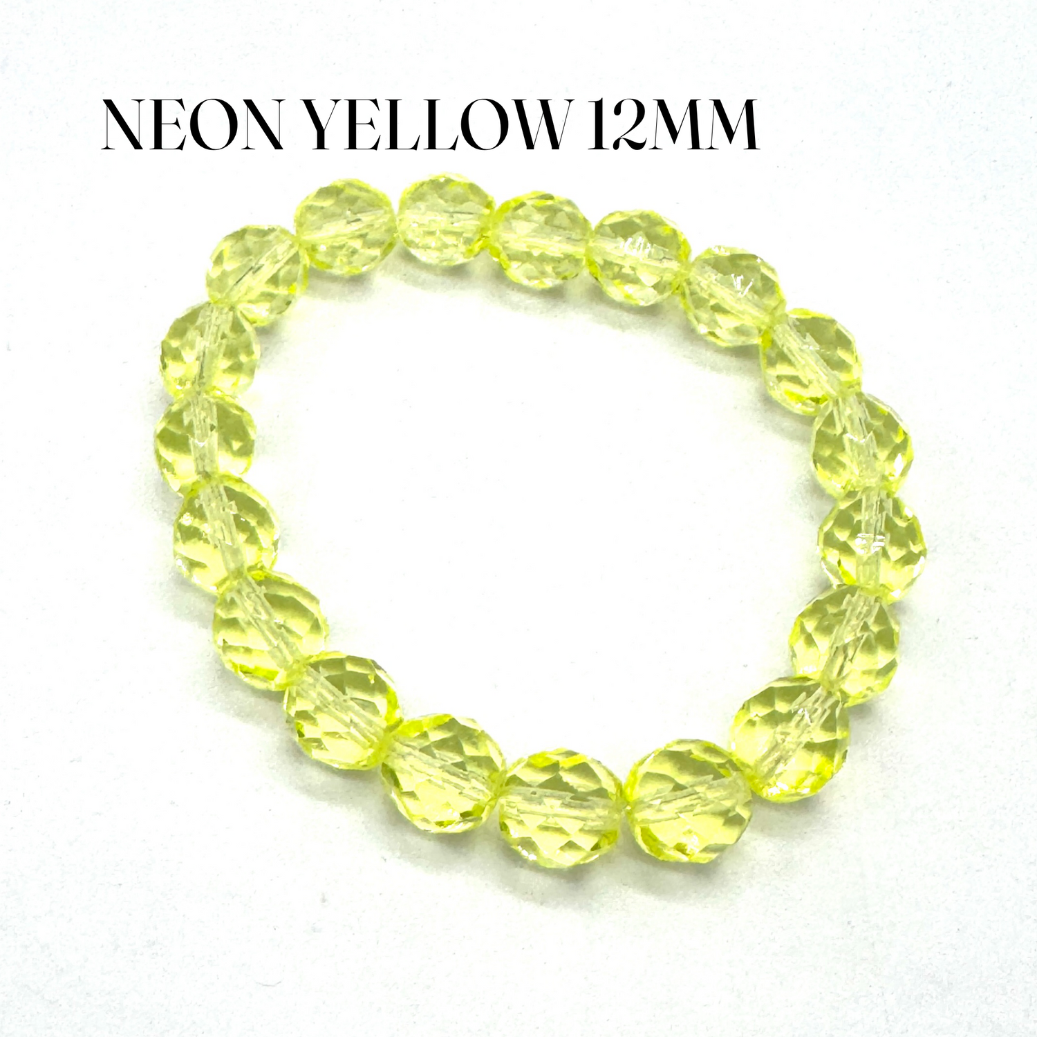 Neon yellow beaded bracelet on a white background with text indicating size.