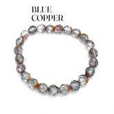 Blue copper beaded bracelet on a white background with &