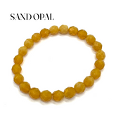 Sand opal bracelet on a white background with &