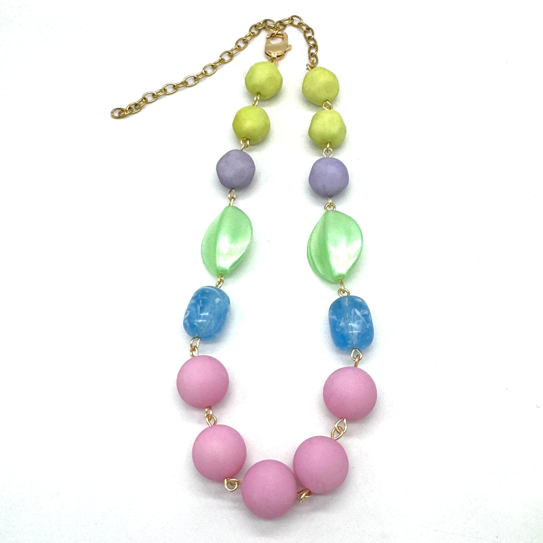 Necklace with colorful beads on a white background