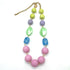 Necklace with colorful beads on a white background
