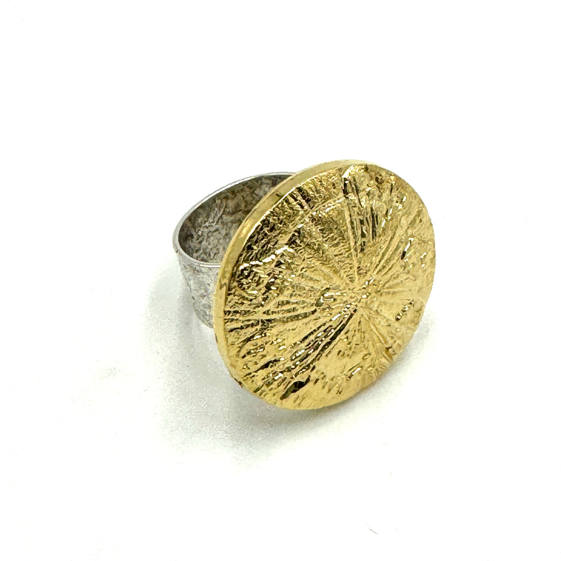 gold fossil style ring on adjustable silver base