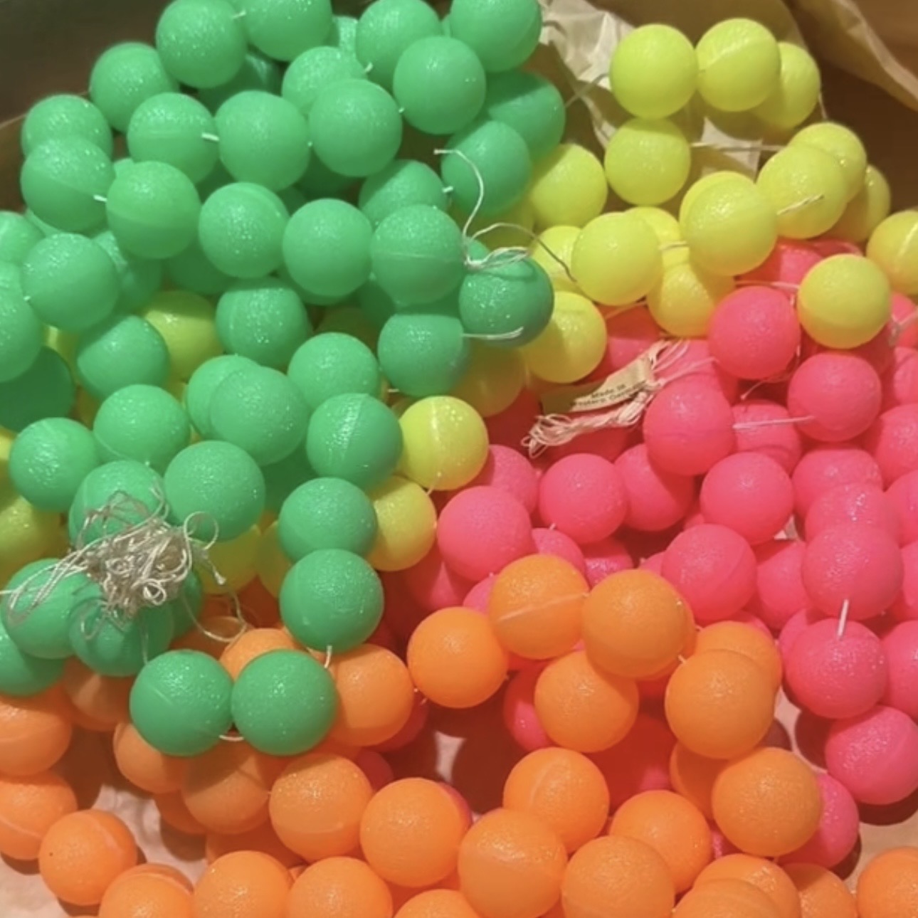 Neon colored vintage beads on strands