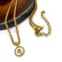 Gold necklace on a white background