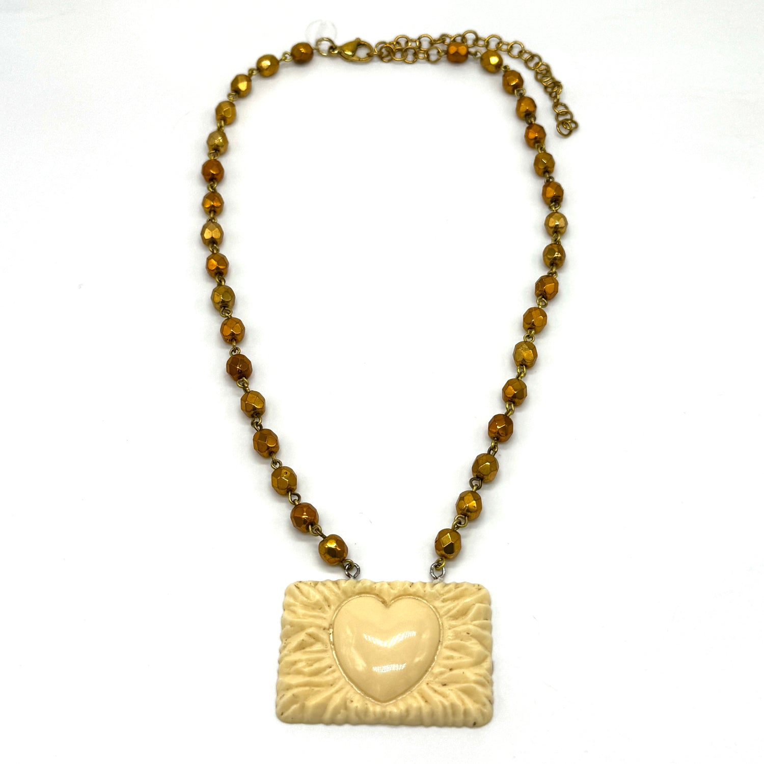 Necklace with heart-shaped pendant on a white background