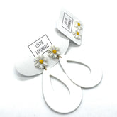 White floral earrings with &