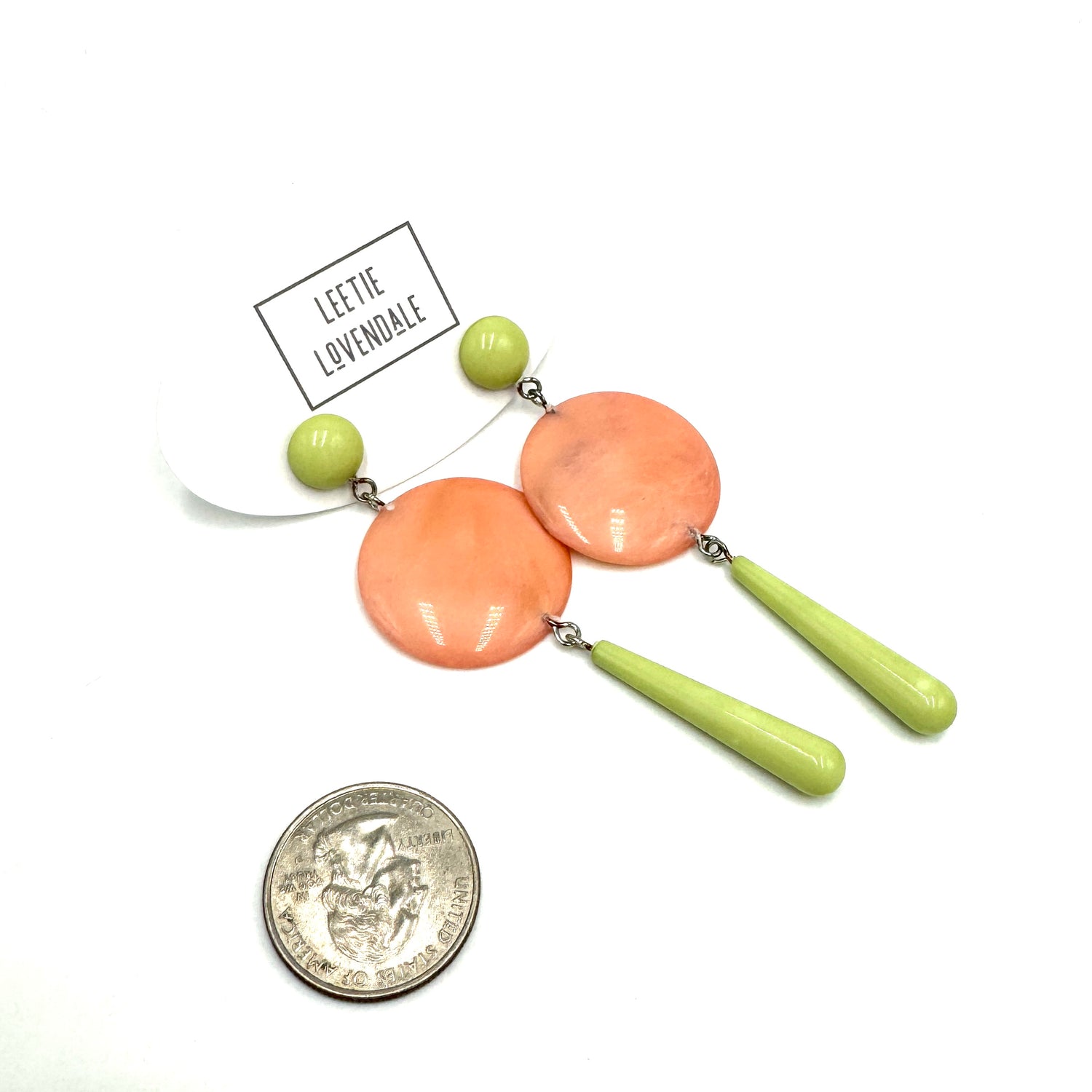 mint and peach colored statement earrings