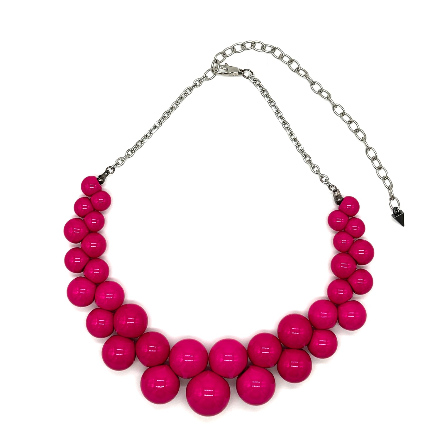 Necklace with pink beads and a silver chain on a white background