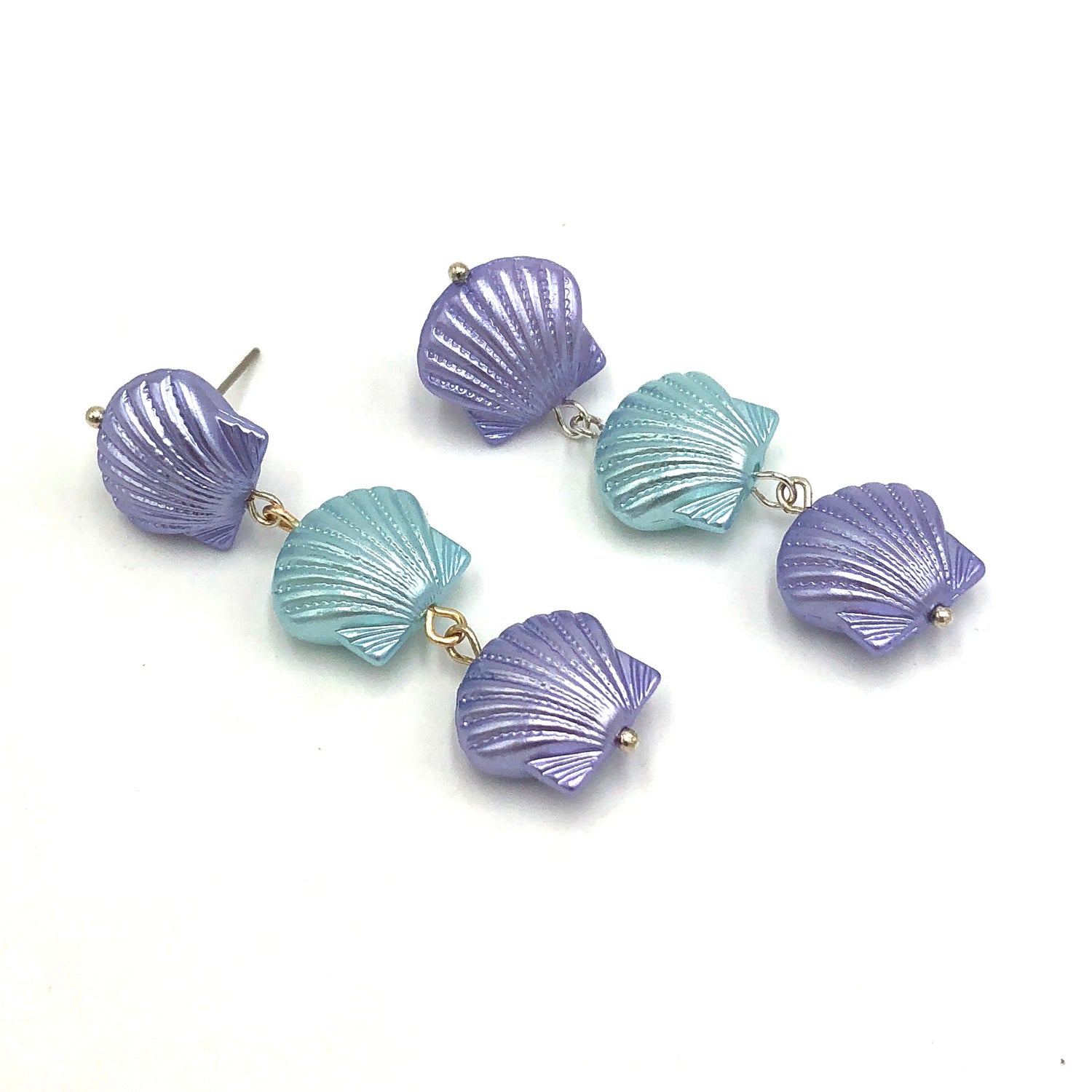 purple and ice blue seashell style earrings