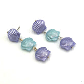 purple and ice blue seashell style earrings