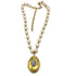 Pearl necklace with a gold locket on a white background