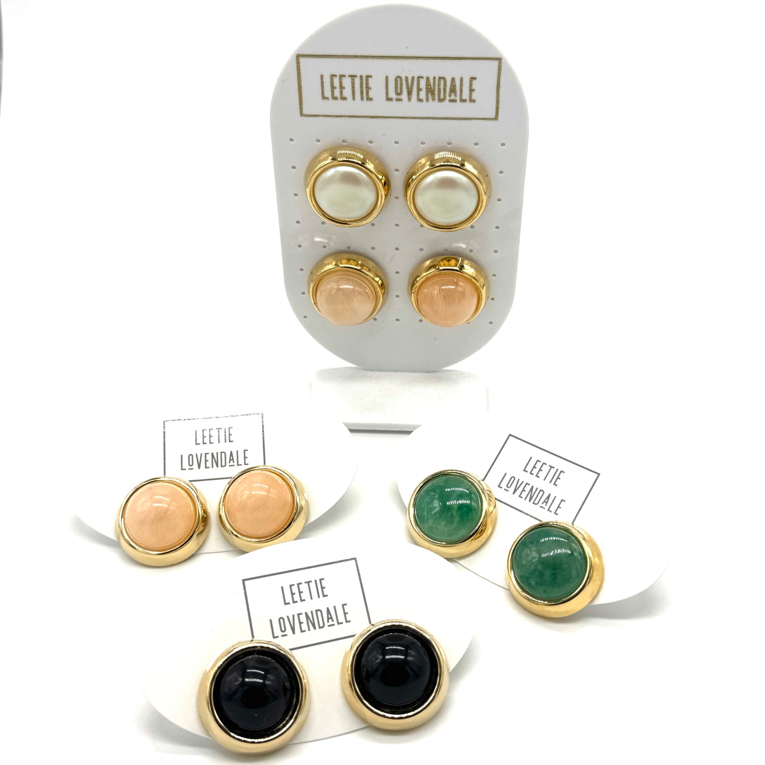 Set of earrings on display cards with &