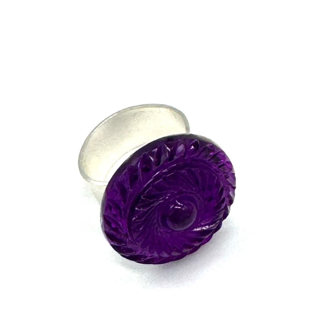 Purple lucite cocktail ring with silver base on a white background