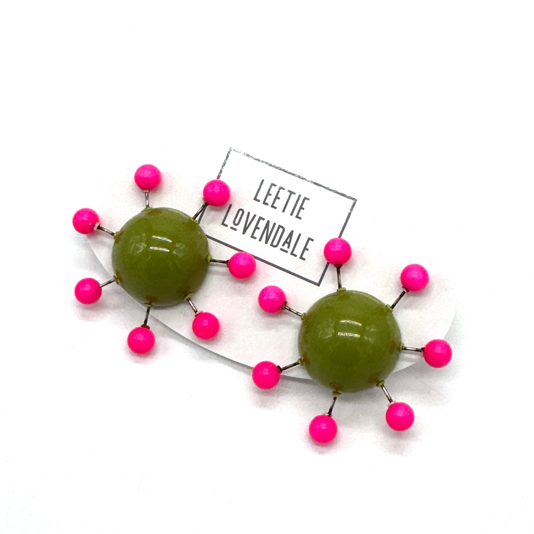 OlIve green earrings with hot pink beads radiating from center with posts