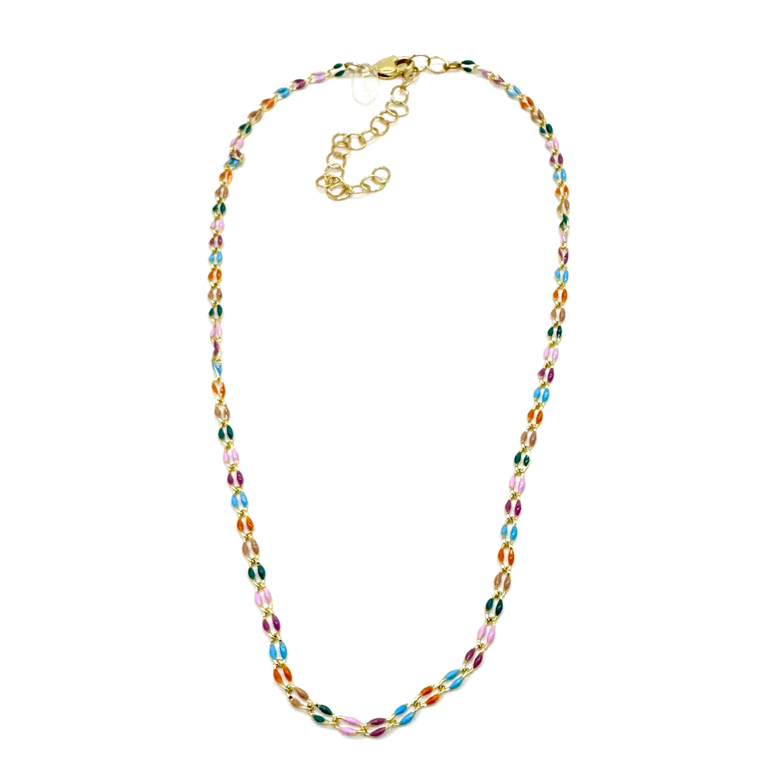 A golden chain necklace with colorful enameled links on a white background.