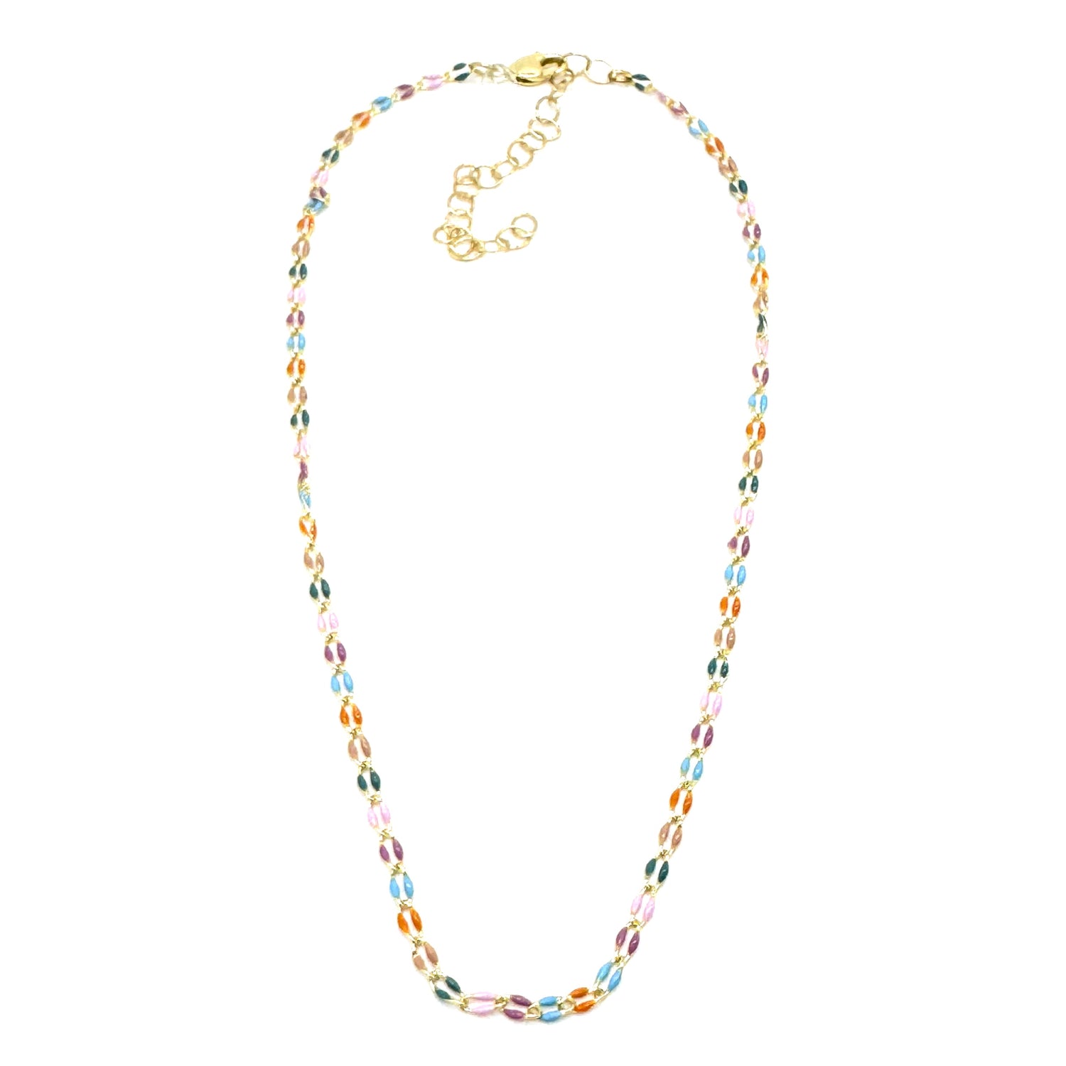 A golden chain necklace with colorful enameled links on a white background.