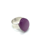 Cocktail ring featuring large purple moonglow focal on a white background.