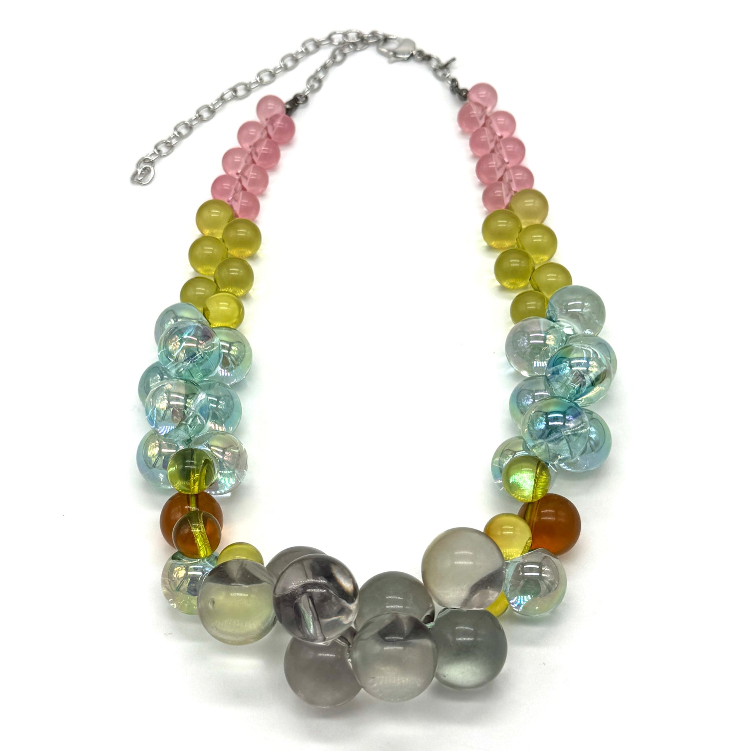 Multicolored bauble necklace on a white background.