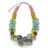 Multicolored bauble necklace on a white background.