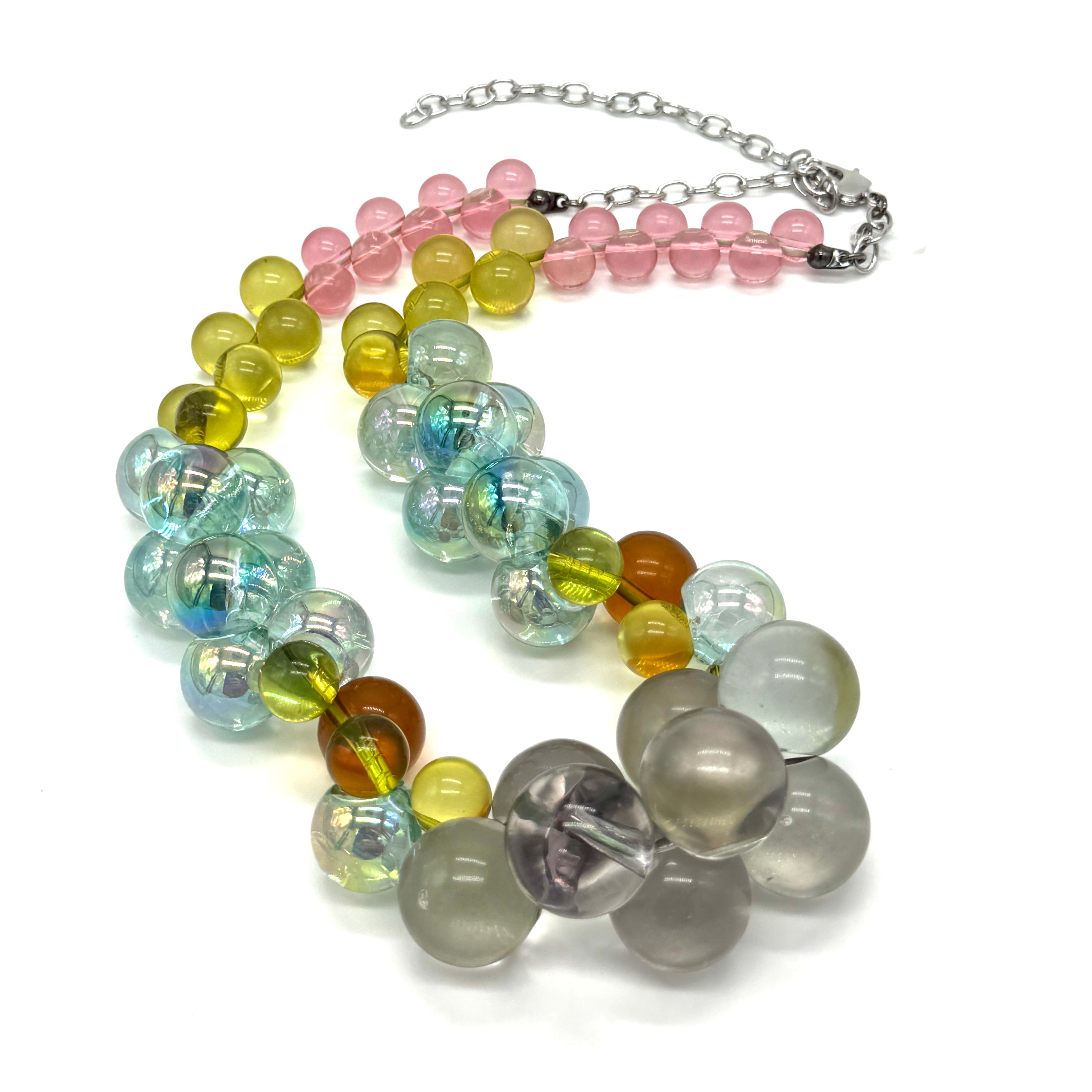 Multicolored bauble necklace on a white background.