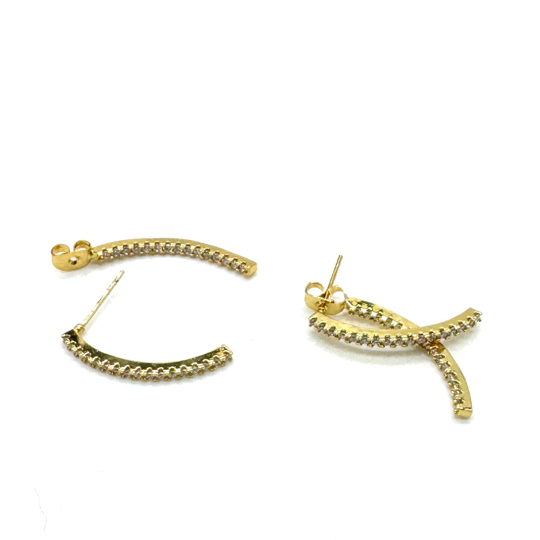 Golden stud earrings with an intersecting silhouette accented with sparkling cubic zirconias.