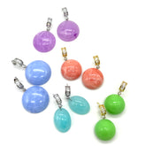 Brightly colored lucite earrings on a white background.