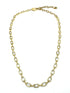 Gold chain necklace on a white background