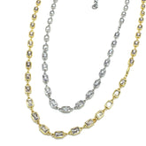Two gold and silver necklaces with diamond-like stones on a white background